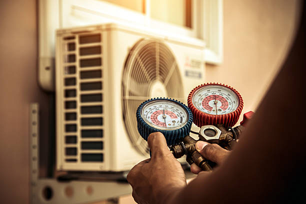 Professional Heat Pump Repair technician working in Seymour, WI